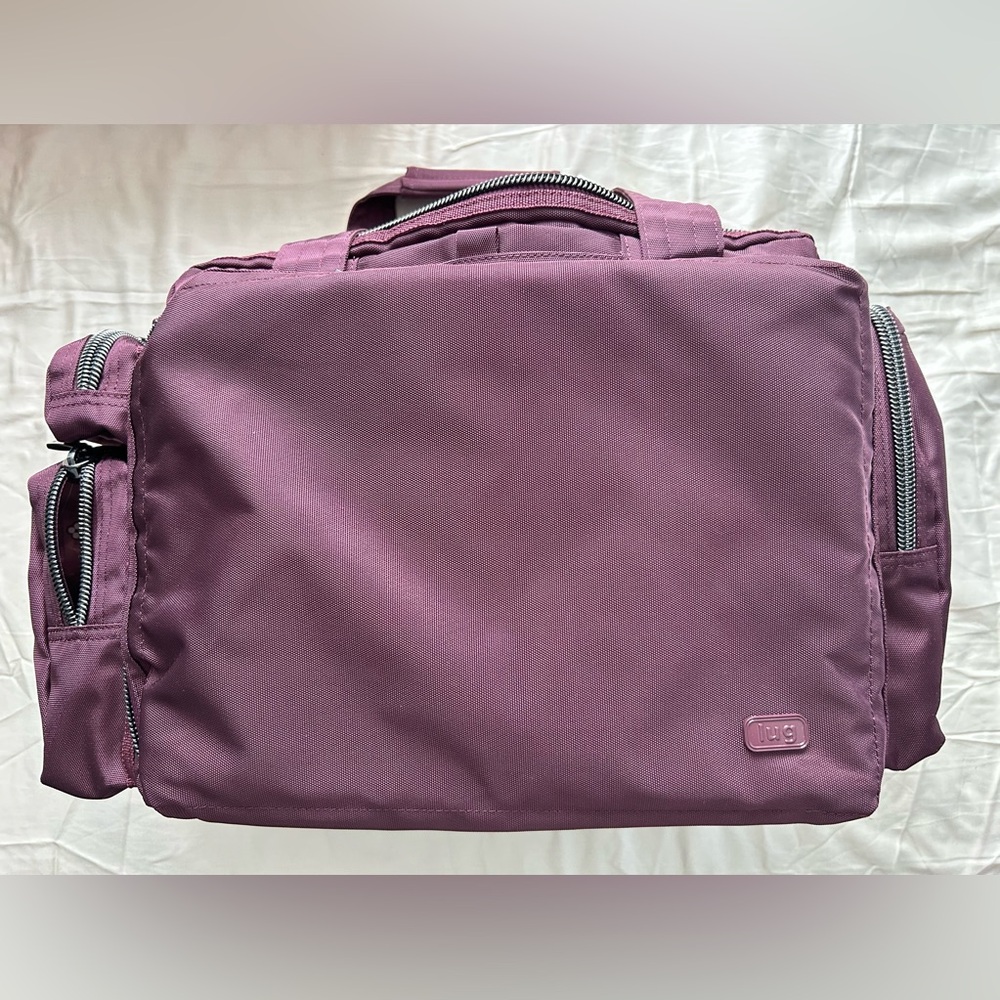 Lug Wine colored Carry On Bag new without tags, never used